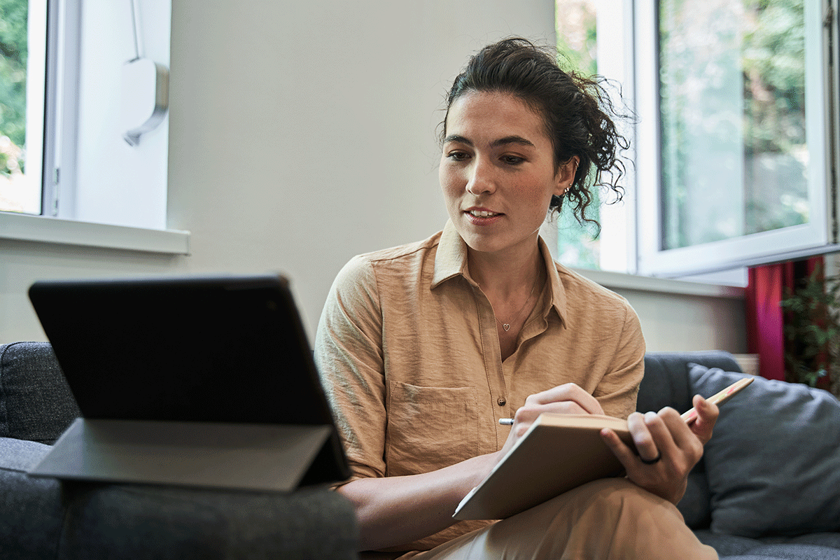 a woman works a remote mental health counseling job